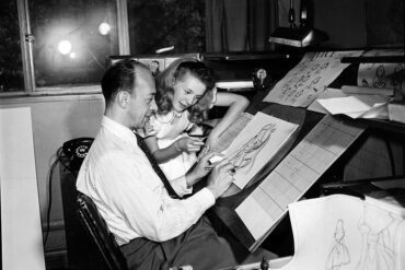 classic disney animator at drawing table