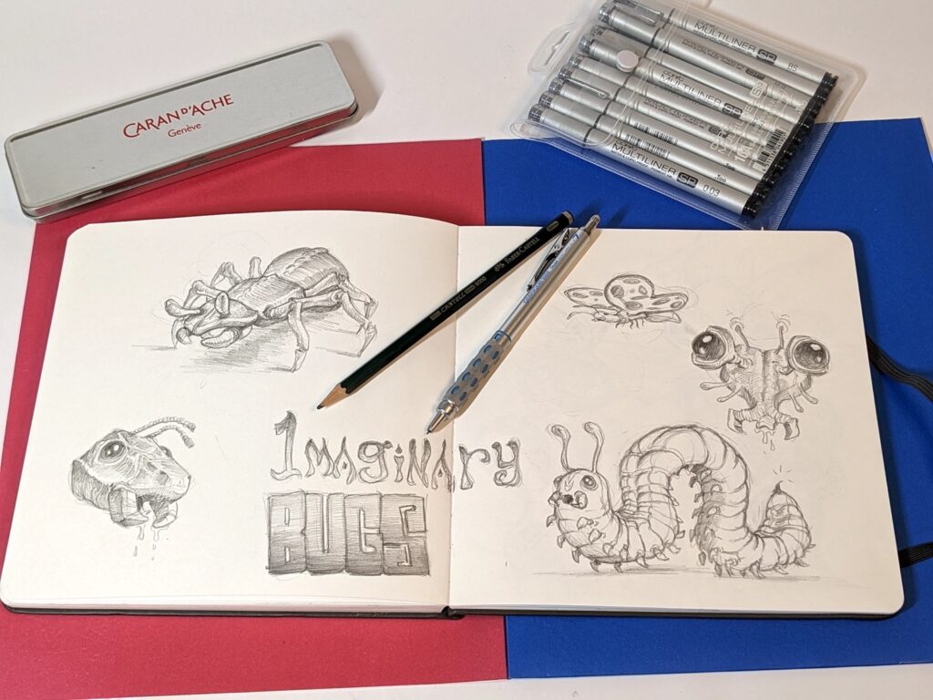 bug sketches on an open sketchbook